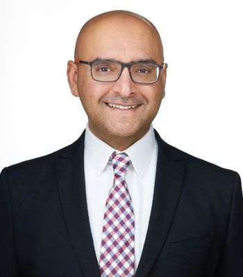 Portrait of Kamran Amjad, Associate.