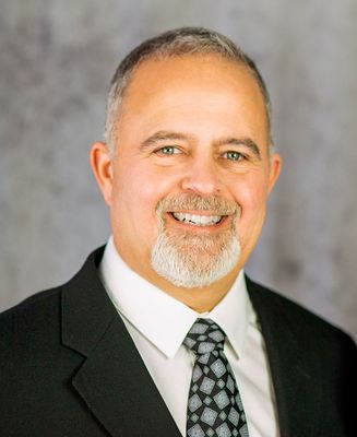Portrait of Michael Grekul, Associate