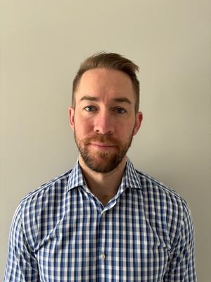 Portrait of Zach Kohn, Associate